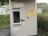 a machine that is sitting in the middle of a parking lot