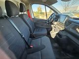 a view of the inside of a car from the driver ' s seat