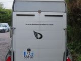 an image of a trailer parked on the side of the road