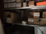 many boxes on the shelves in the room