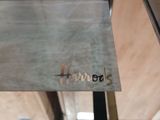 a close up of a piece of metal with the word harros written on it