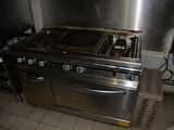 a stove and oven in the kitchen of a restaurant
