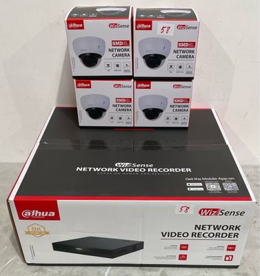three boxes of three different types of video recorders sitting on top of each other