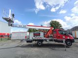 a red truck that is parked in the parking lot
