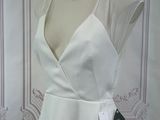 a picture of a white dress on a mannequin mannequin