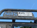 a sign on the back of a truck that says mtts