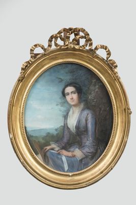 portrait d'une femme en robe bleue dans un cadre doré