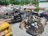 a pile of machinery that is sitting on the ground