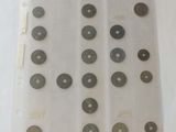a lot of different types of coins on the table