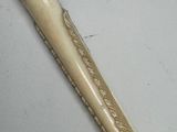 an image of a baseball bat with a wooden handle