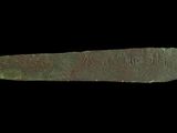 an image of a piece of metal on a black background