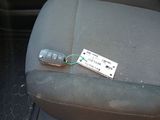an image of a remote control in the back of a car