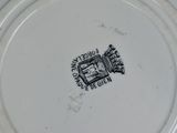an image of a white plate with a black and white design on it