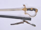 two different types of swords on a white surface