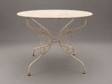 a white table with a white top and a metal base