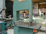 an image of a machine shop with a large machine in the background