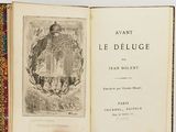 an open book with a picture of a building in the background