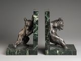 pair of bronze bookends of a cat and a dog on marble bases
