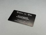 a close up of a business card on a table