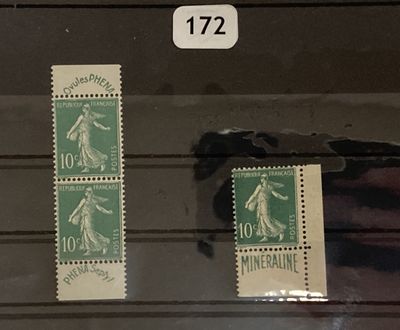 two stamps on a display in a glass case