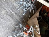 many pieces of metal that are sitting on the ground