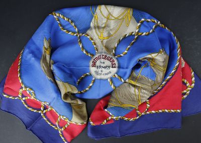 a blue and red scarf on a black table