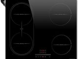 a black stove top with three burners and three burners