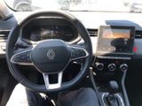 the interior of a car with a steering wheel and a dash board