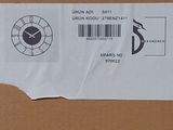 a cardboard box with a sticker on the side of it