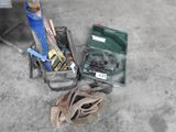a box of tools sitting on the floor next to a pair of shoes