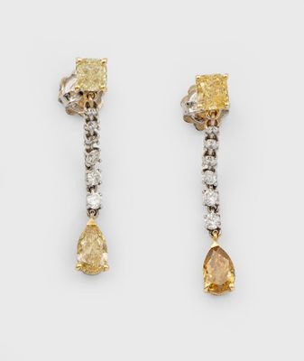 a pair of yellow and white diamond earrings
