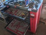 a workbench with tools on it in a garage