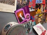 a display of various items on the wall of a room