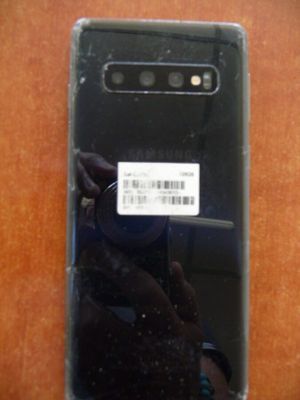 someone is taking a picture of the back of a cell phone