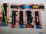 five different types of scissors and a pair of scissors on a table