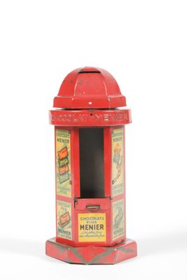 a small red box with a picture of a man on it
