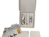 a white box with a cell phone inside of it