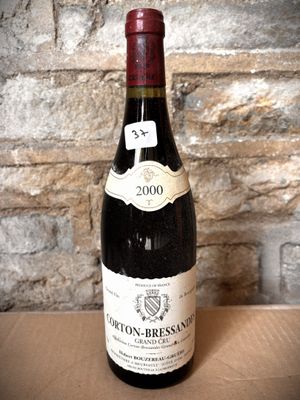 a bottle of wine that is sitting on a table