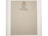 a white picture frame with a gold triangle on it