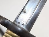 a close up of a person holding a knife in their hand