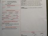 a sheet of paper with information on it sitting on a table