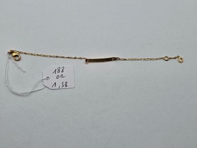 an image of a gold bracelet with a chain attached to it