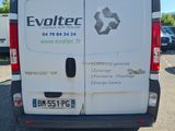 a white van that is parked in a parking lot