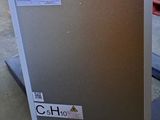 an image of a refrigerator sitting on a cart in a warehouse