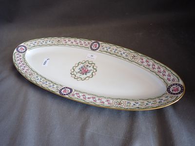a large oval platter with a floral design on it