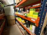 a shelf with many items in it in a warehouse