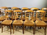 a lot of chairs that are lined up together