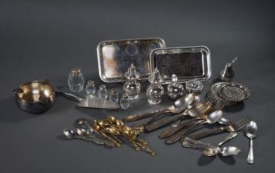 a lot of silver and silverware on a table