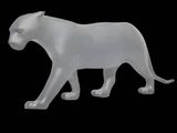 a glass figurine of a cat on a black background