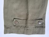 a close up of a pair of pants with buttons on them